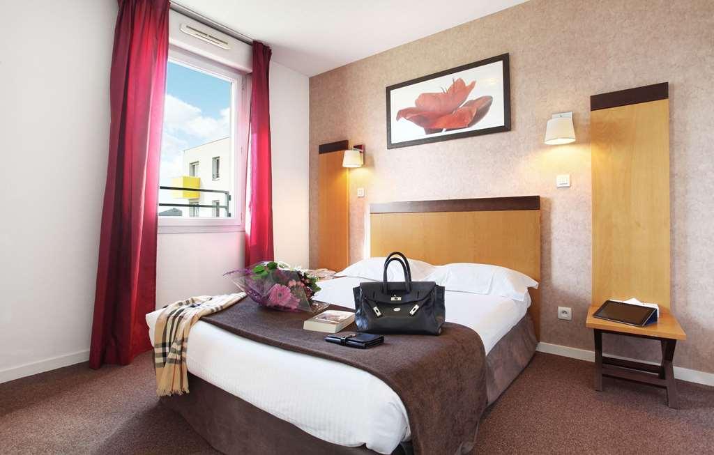 Appart'Hotel Odalys City - Bioparc Lyon Est Szoba fotó