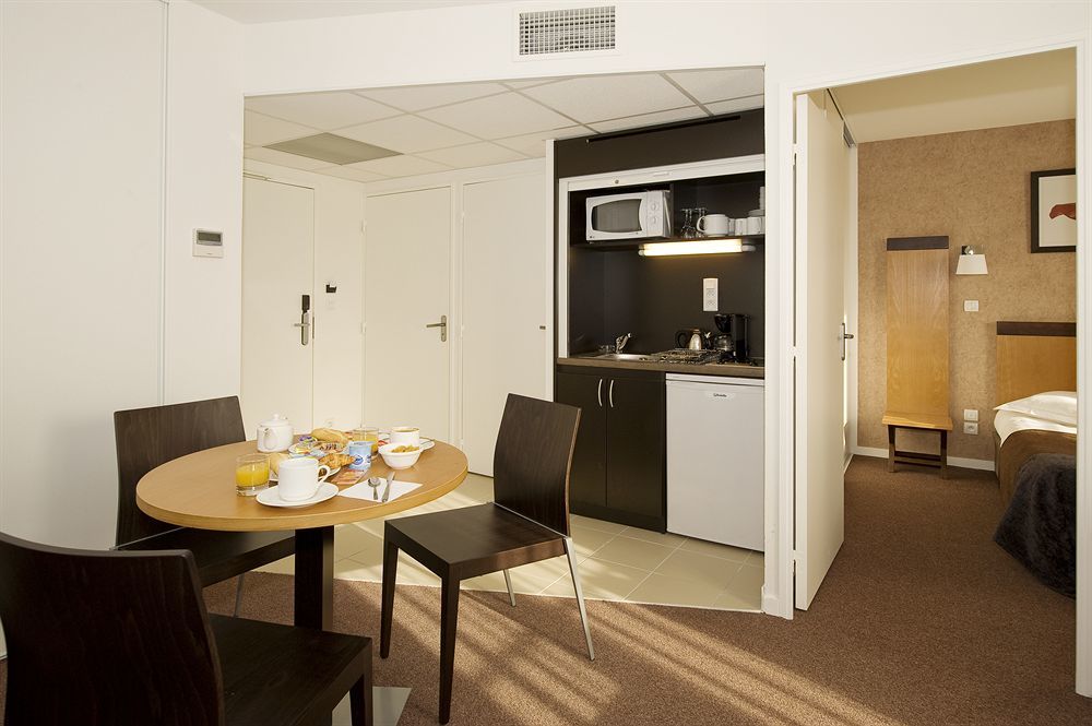 Appart'Hotel Odalys City - Bioparc Lyon Est Szoba fotó
